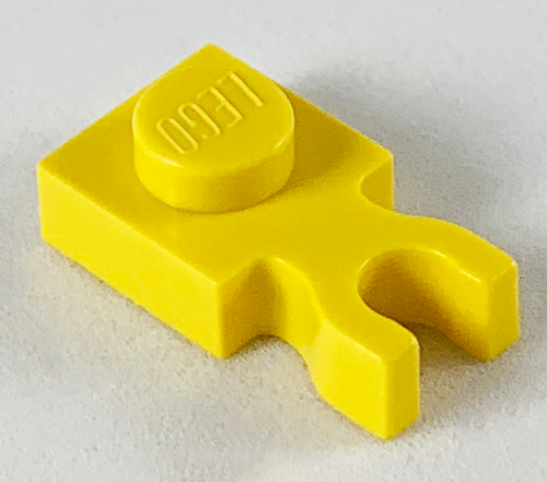 LEGO 4085c: Yellow Plate, Modified 1 x 1 with U Clip Thick (Vertical Grip)